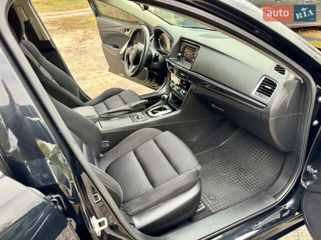 Черный Мазда 6, объемом двигателя 2 л и пробегом 152 тыс. км за 12490 $, фото 24 на Automoto.ua