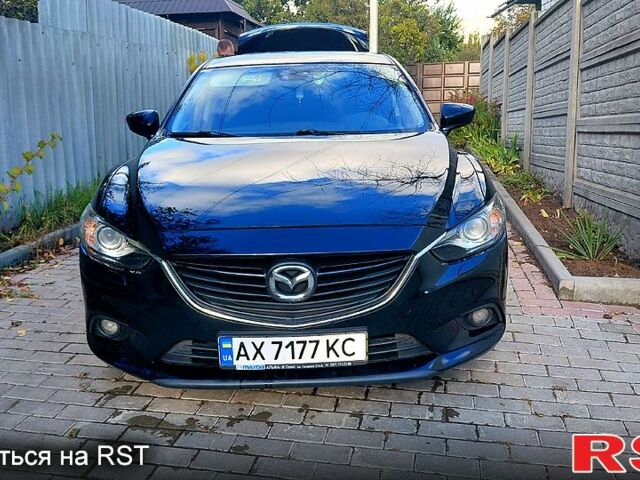 Черный Мазда 6, объемом двигателя 2.5 л и пробегом 94 тыс. км за 12900 $, фото 1 на Automoto.ua