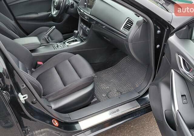 Черный Мазда 6, объемом двигателя 2.49 л и пробегом 94 тыс. км за 12850 $, фото 2 на Automoto.ua