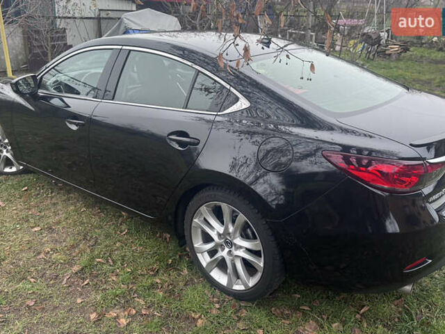 Черный Мазда 6, объемом двигателя 2.49 л и пробегом 178 тыс. км за 11900 $, фото 10 на Automoto.ua