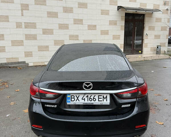 Черный Мазда 6, объемом двигателя 2.49 л и пробегом 161 тыс. км за 10300 $, фото 1 на Automoto.ua