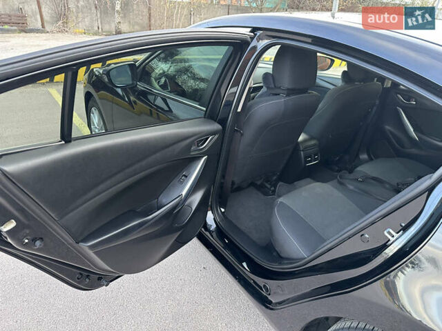 Чорний Мазда 6, об'ємом двигуна 2 л та пробігом 118 тис. км за 10500 $, фото 17 на Automoto.ua