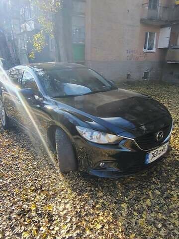 Черный Мазда 6, объемом двигателя 2.49 л и пробегом 131 тыс. км за 10799 $, фото 1 на Automoto.ua