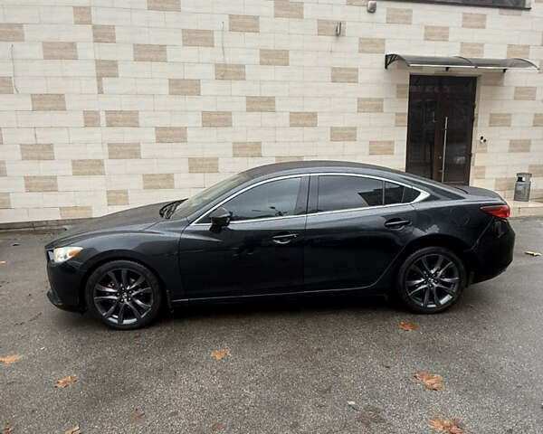 Черный Мазда 6, объемом двигателя 2.49 л и пробегом 161 тыс. км за 10300 $, фото 2 на Automoto.ua