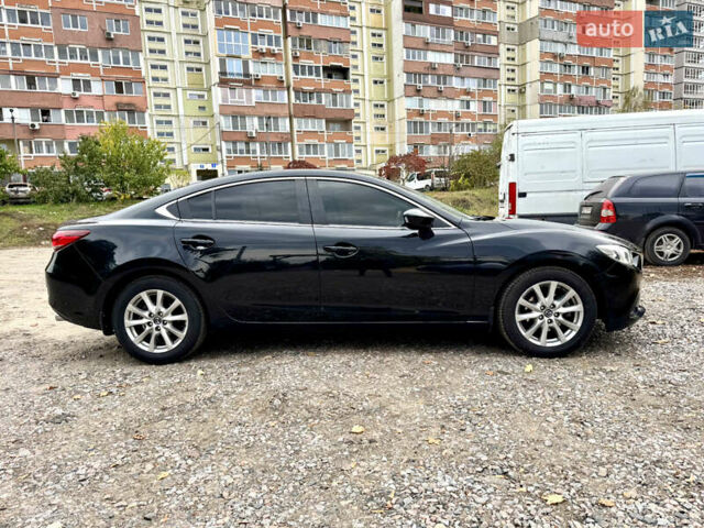 Черный Мазда 6, объемом двигателя 2 л и пробегом 152 тыс. км за 12490 $, фото 1 на Automoto.ua