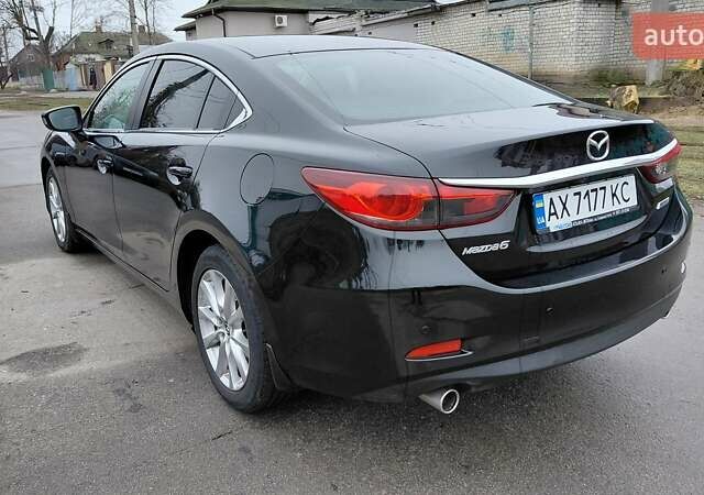 Черный Мазда 6, объемом двигателя 2.49 л и пробегом 94 тыс. км за 12850 $, фото 17 на Automoto.ua