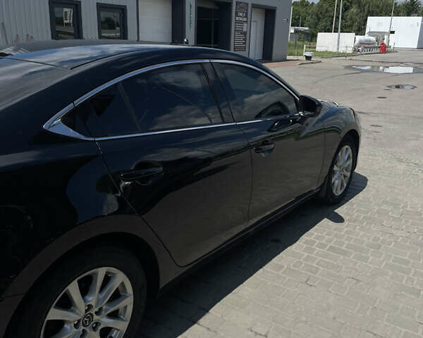 Черный Мазда 6, объемом двигателя 2.49 л и пробегом 217 тыс. км за 10900 $, фото 2 на Automoto.ua