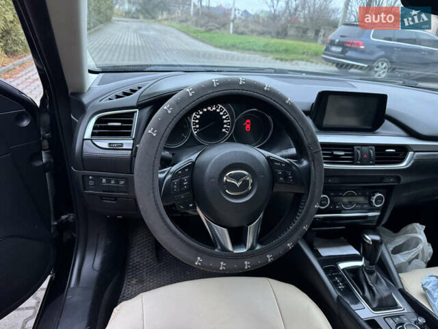 Черный Мазда 6, объемом двигателя 2.2 л и пробегом 325 тыс. км за 13000 $, фото 6 на Automoto.ua