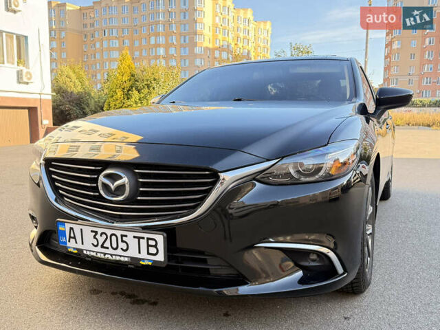 Черный Мазда 6, объемом двигателя 2.49 л и пробегом 174 тыс. км за 15950 $, фото 4 на Automoto.ua
