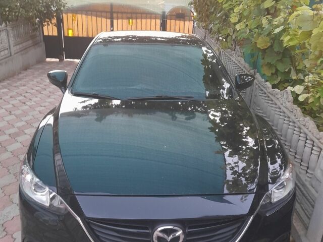 Черный Мазда 6, объемом двигателя 2.5 л и пробегом 198 тыс. км за 10900 $, фото 1 на Automoto.ua