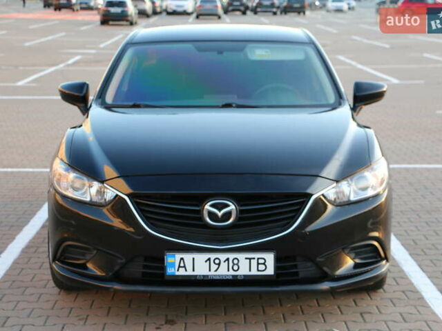Черный Мазда 6, объемом двигателя 2.5 л и пробегом 179 тыс. км за 11700 $, фото 1 на Automoto.ua