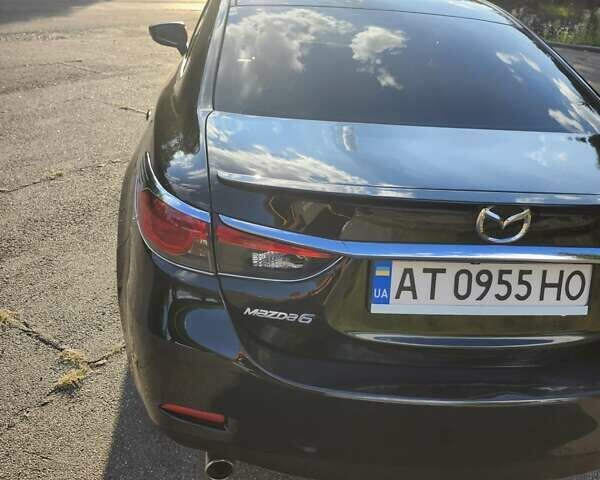 Черный Мазда 6, объемом двигателя 2.49 л и пробегом 232 тыс. км за 12000 $, фото 2 на Automoto.ua