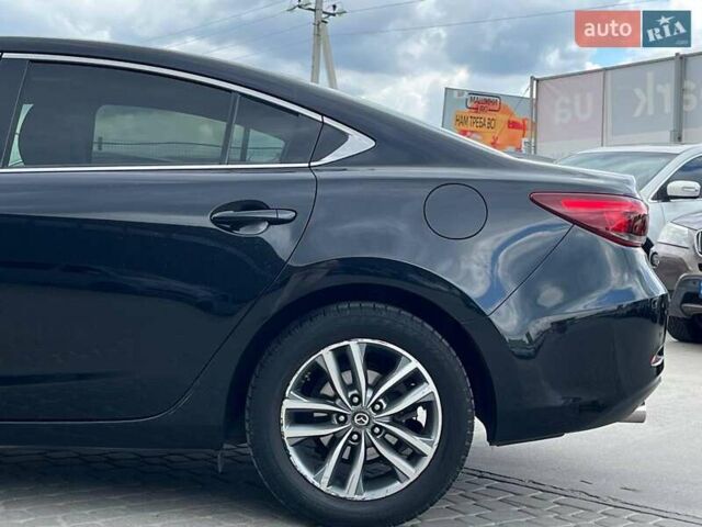 Черный Мазда 6, объемом двигателя 2.2 л и пробегом 178 тыс. км за 15990 $, фото 10 на Automoto.ua