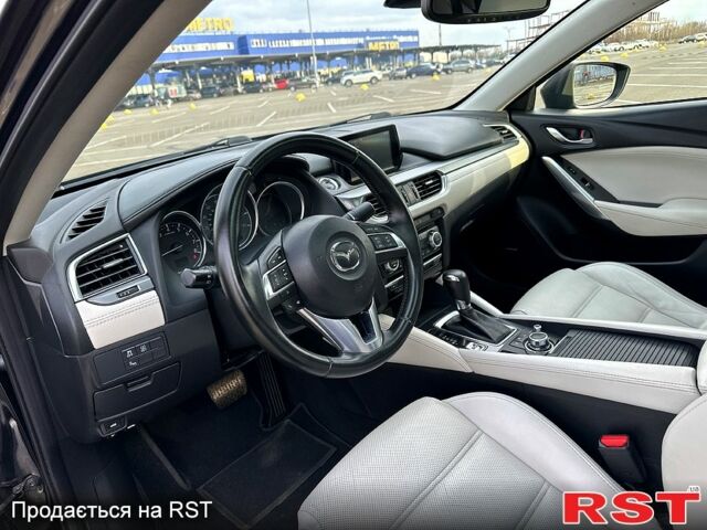 Черный Мазда 6, объемом двигателя 25 л и пробегом 152 тыс. км за 12999 $, фото 8 на Automoto.ua