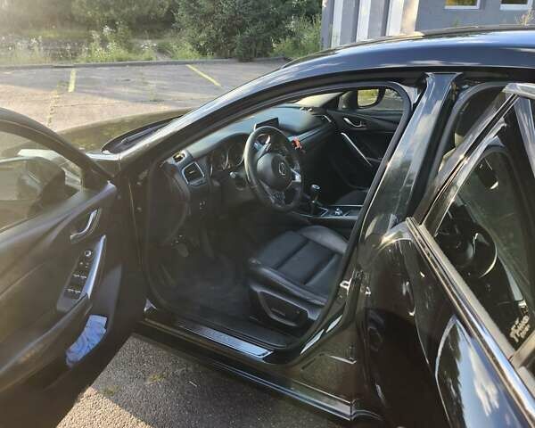 Черный Мазда 6, объемом двигателя 2.49 л и пробегом 232 тыс. км за 12000 $, фото 14 на Automoto.ua