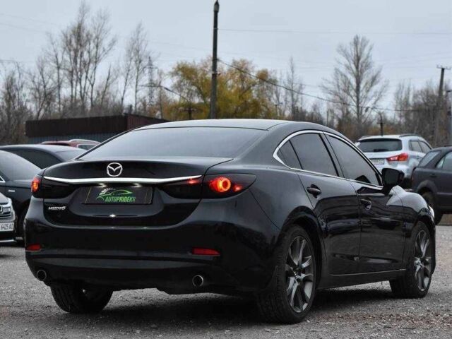 Черный Мазда 6, объемом двигателя 2.5 л и пробегом 182 тыс. км за 12999 $, фото 1 на Automoto.ua