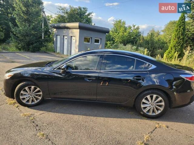 Черный Мазда 6, объемом двигателя 2.49 л и пробегом 232 тыс. км за 12000 $, фото 5 на Automoto.ua