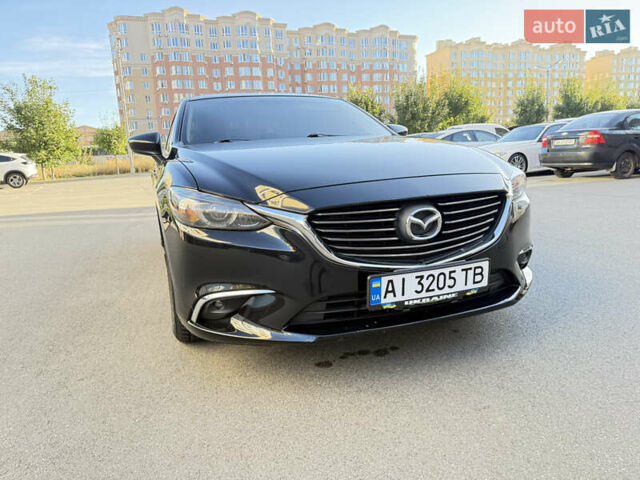 Черный Мазда 6, объемом двигателя 2.49 л и пробегом 174 тыс. км за 15950 $, фото 5 на Automoto.ua