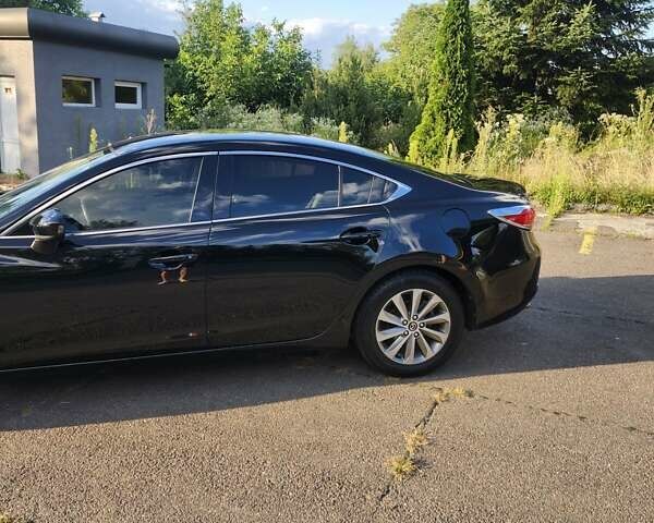 Черный Мазда 6, объемом двигателя 2.49 л и пробегом 232 тыс. км за 12000 $, фото 9 на Automoto.ua