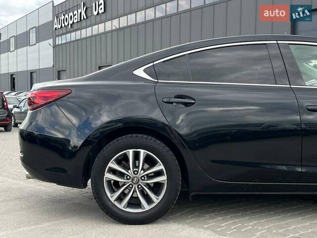 Черный Мазда 6, объемом двигателя 2.2 л и пробегом 178 тыс. км за 15990 $, фото 6 на Automoto.ua