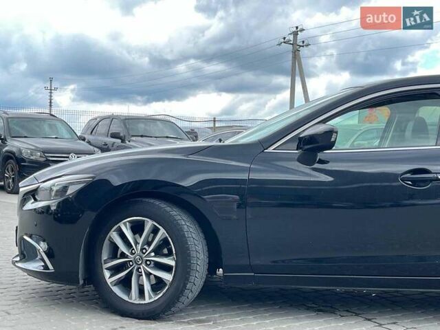 Черный Мазда 6, объемом двигателя 2.2 л и пробегом 178 тыс. км за 15990 $, фото 12 на Automoto.ua