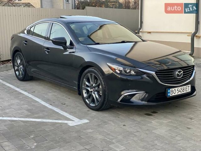 Чорний Мазда 6, об'ємом двигуна 2.49 л та пробігом 117 тис. км за 13200 $, фото 1 на Automoto.ua