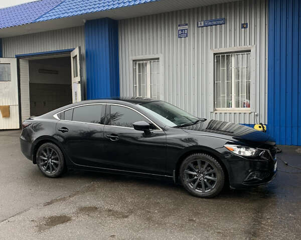 Черный Мазда 6, объемом двигателя 2.49 л и пробегом 173 тыс. км за 13100 $, фото 1 на Automoto.ua