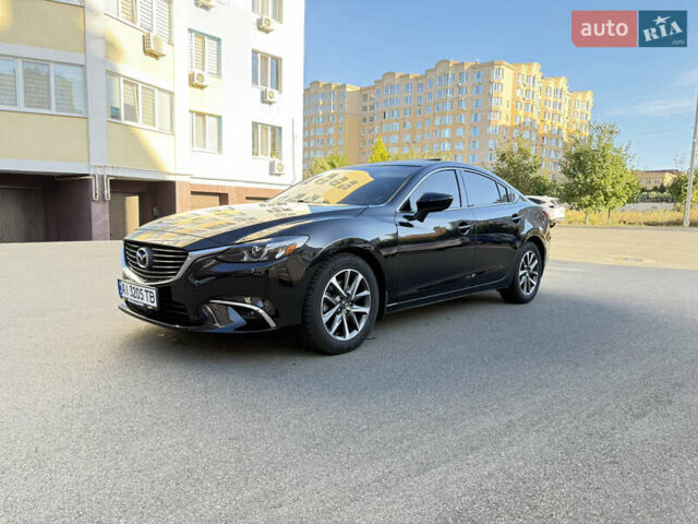 Черный Мазда 6, объемом двигателя 2.49 л и пробегом 174 тыс. км за 15950 $, фото 3 на Automoto.ua