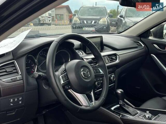 Черный Мазда 6, объемом двигателя 2.2 л и пробегом 178 тыс. км за 15990 $, фото 13 на Automoto.ua