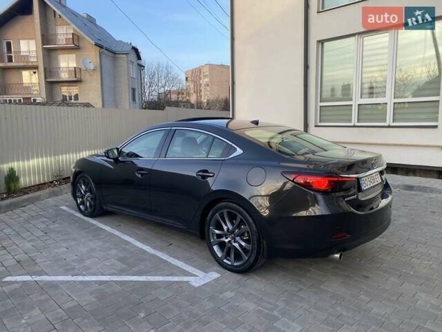 Чорний Мазда 6, об'ємом двигуна 2.49 л та пробігом 117 тис. км за 13200 $, фото 4 на Automoto.ua