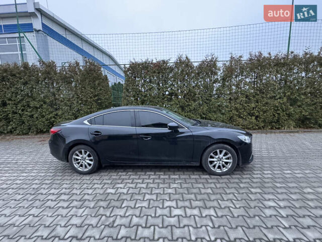 Черный Мазда 6, объемом двигателя 2.2 л и пробегом 325 тыс. км за 13000 $, фото 3 на Automoto.ua