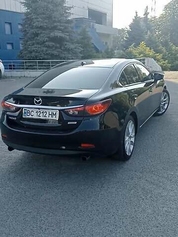 Черный Мазда 6, объемом двигателя 2.49 л и пробегом 157 тыс. км за 12200 $, фото 6 на Automoto.ua