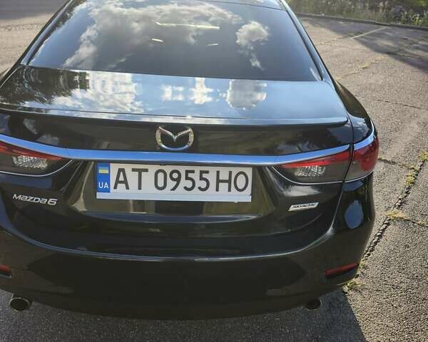 Черный Мазда 6, объемом двигателя 2.49 л и пробегом 232 тыс. км за 12000 $, фото 1 на Automoto.ua