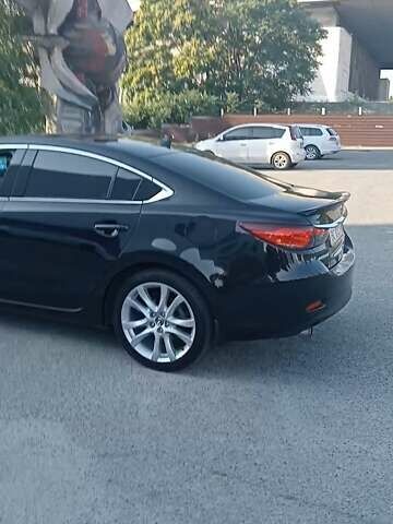 Черный Мазда 6, объемом двигателя 2.49 л и пробегом 157 тыс. км за 12200 $, фото 1 на Automoto.ua