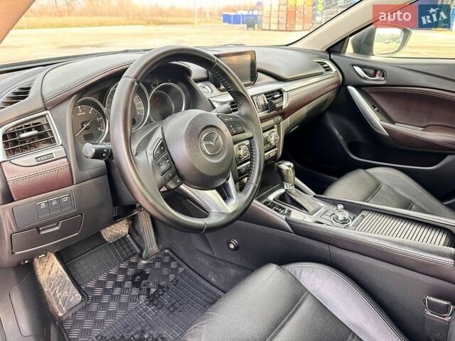 Черный Мазда 6, объемом двигателя 2.19 л и пробегом 198 тыс. км за 13200 $, фото 25 на Automoto.ua