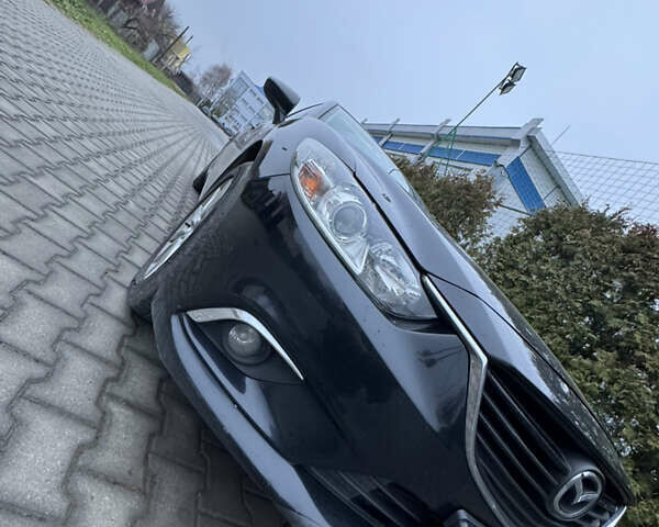 Черный Мазда 6, объемом двигателя 2.2 л и пробегом 325 тыс. км за 13000 $, фото 1 на Automoto.ua