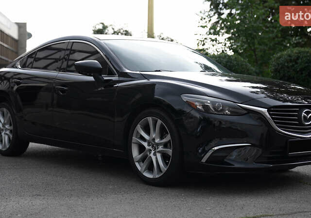 Черный Мазда 6, объемом двигателя 2.49 л и пробегом 205 тыс. км за 14999 $, фото 1 на Automoto.ua