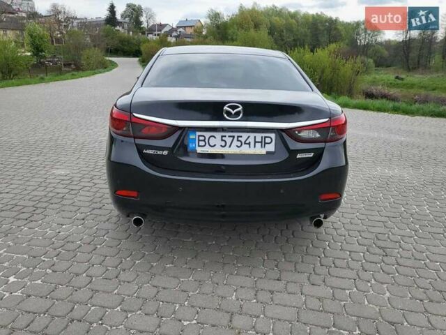 Чорний Мазда 6, об'ємом двигуна 2.2 л та пробігом 100 тис. км за 16200 $, фото 3 на Automoto.ua