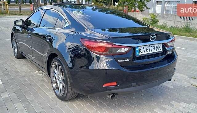 Черный Мазда 6, объемом двигателя 2.49 л и пробегом 210 тыс. км за 11800 $, фото 6 на Automoto.ua