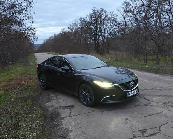 Чорний Мазда 6, об'ємом двигуна 2.49 л та пробігом 198 тис. км за 14000 $, фото 1 на Automoto.ua