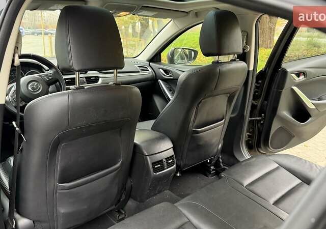 Черный Мазда 6, объемом двигателя 2.49 л и пробегом 129 тыс. км за 12500 $, фото 10 на Automoto.ua