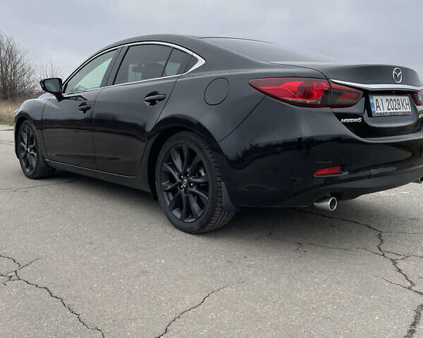 Чорний Мазда 6, об'ємом двигуна 2.5 л та пробігом 81 тис. км за 15300 $, фото 4 на Automoto.ua