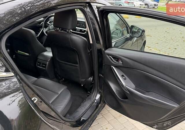 Черный Мазда 6, объемом двигателя 2.49 л и пробегом 129 тыс. км за 12500 $, фото 7 на Automoto.ua