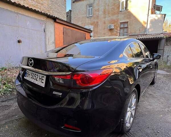 Черный Мазда 6, объемом двигателя 2 л и пробегом 50 тыс. км за 16000 $, фото 5 на Automoto.ua