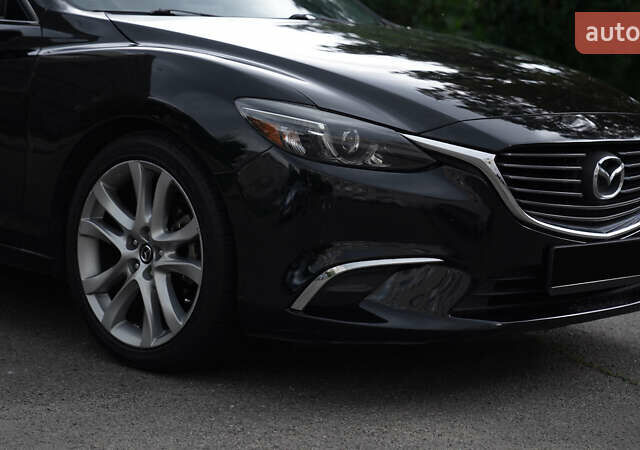 Черный Мазда 6, объемом двигателя 2.49 л и пробегом 205 тыс. км за 14999 $, фото 2 на Automoto.ua