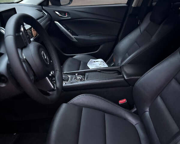 Черный Мазда 6, объемом двигателя 2.5 л и пробегом 182 тыс. км за 13500 $, фото 10 на Automoto.ua