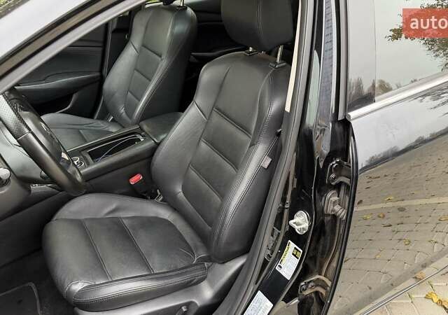 Черный Мазда 6, объемом двигателя 2.49 л и пробегом 129 тыс. км за 12500 $, фото 17 на Automoto.ua
