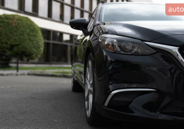 Черный Мазда 6, объемом двигателя 2.49 л и пробегом 205 тыс. км за 14999 $, фото 3 на Automoto.ua