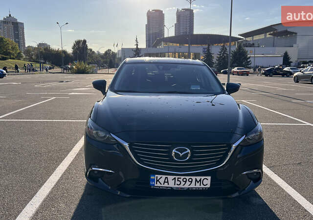 Черный Мазда 6, объемом двигателя 2.49 л и пробегом 156 тыс. км за 14900 $, фото 1 на Automoto.ua