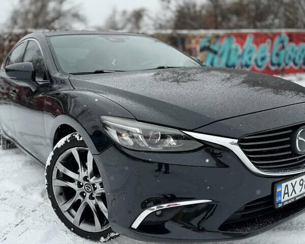 Черный Мазда 6, объемом двигателя 2.49 л и пробегом 155 тыс. км за 17000 $, фото 1 на Automoto.ua